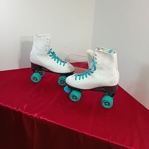C seven White Roller Skates with Teal Accents